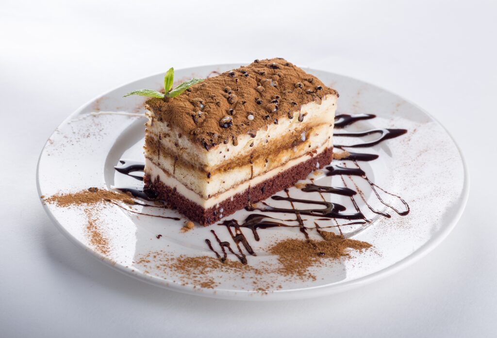 Decadent Layered Cake with Cocoa & Mint - Indulgent Wallpaper Background