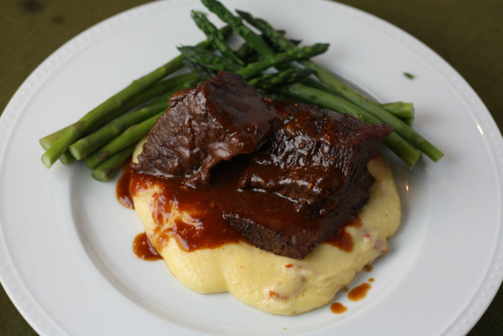 Indulgent Short Ribs & Creamy Polenta: Gourmet Wallpaper Background