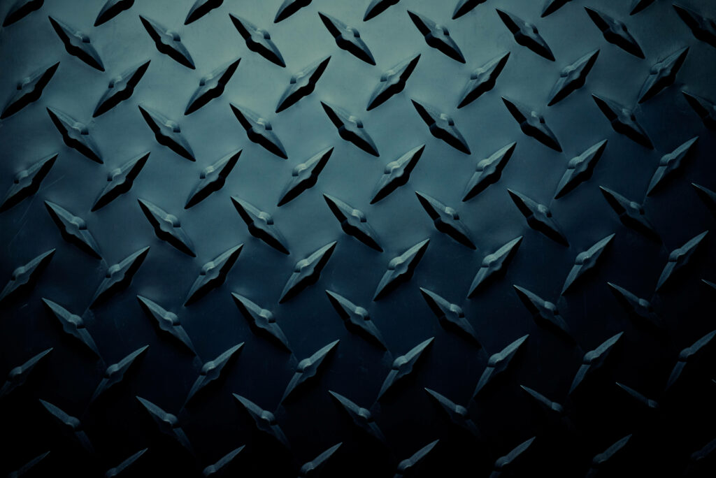 Dark Metallic Diamond Grip Wallpaper: Industrial Textured Background