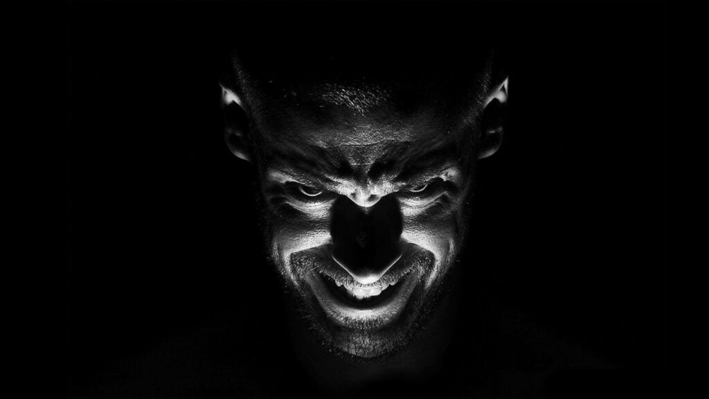 Dark Reflection: Intense Black Devil Portrayal on HD Background Wallpaper