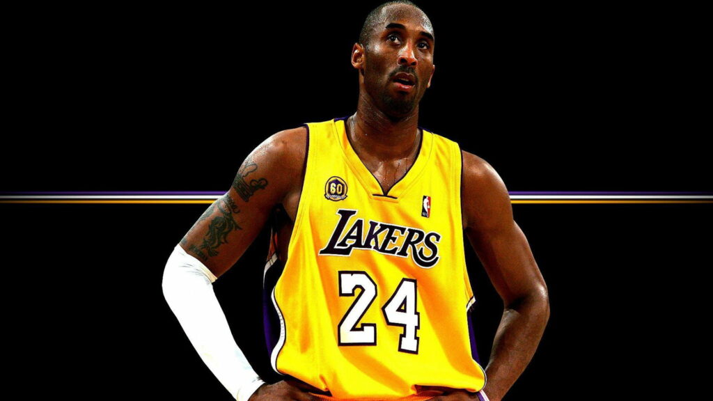 The Mamba's Inked Power: HD Wallpaper of Kobe Bryant's Right Hand Tattoo