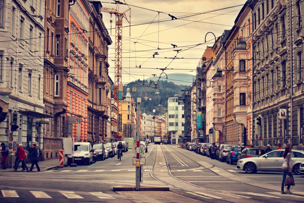 Charming Innsbruck Street Scene Wallpaper: Modern & Historic Mix