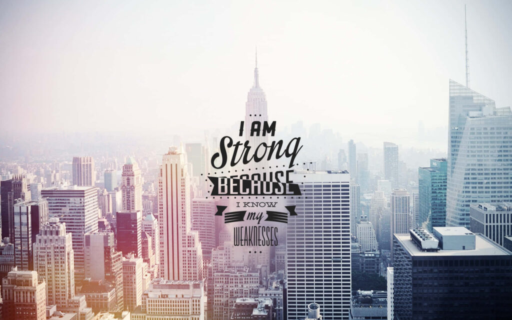 City Skyline & Bold Message: Strength in Knowing Weaknesses Wallpaper