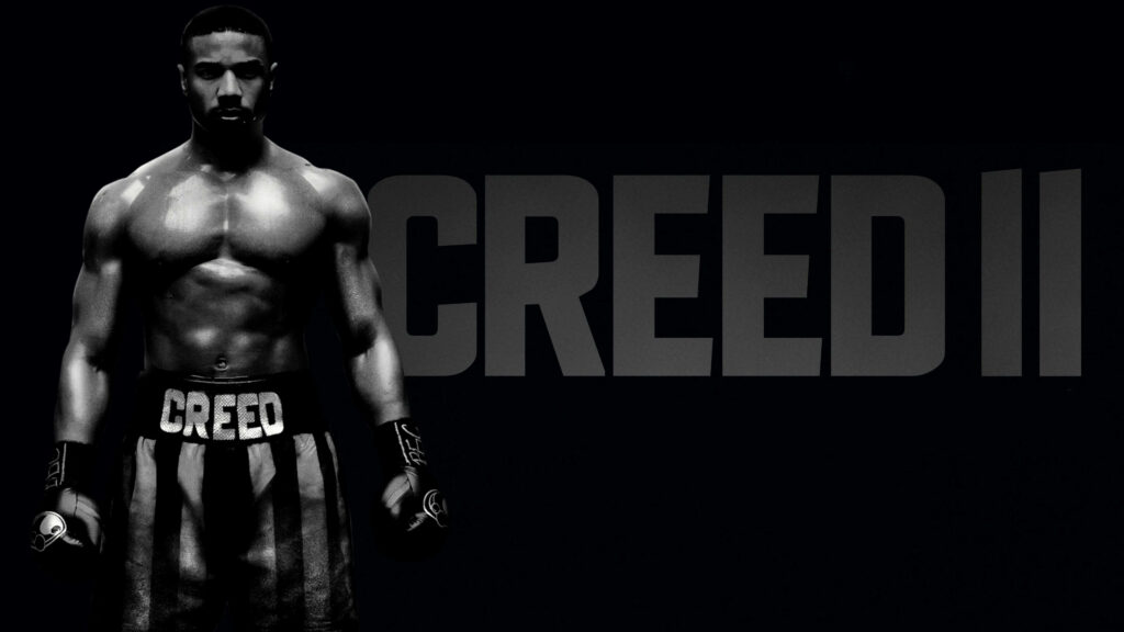 Rising as Ray of Hope: Michael B. Jordan Embodies Donnie Creed in Boxing Arena of Dreams Wallpaper