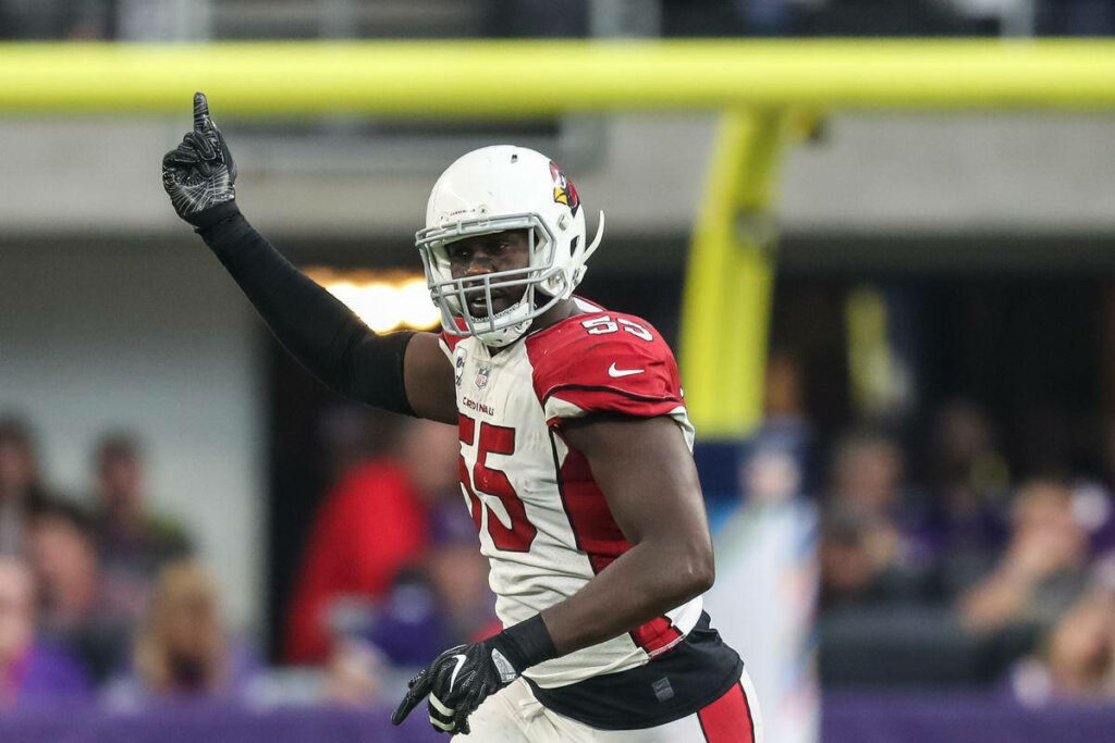 Dynamic Arizona Cardinals Wallpaper: Chandler Jones in Action
