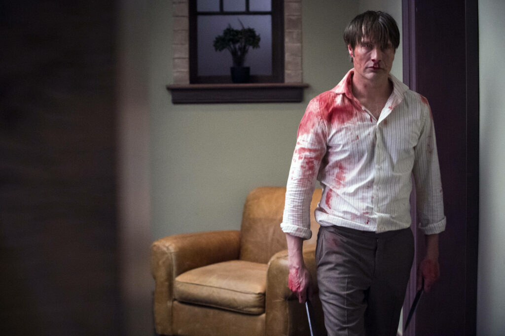 Intense Dr. Hannibal Lecter Wallpaper: Bloodied & Unsettling Background
