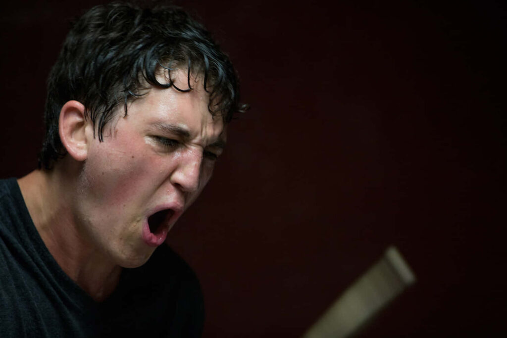 Intense Drummer Wallpaper: Raw Passion & Focus in Action