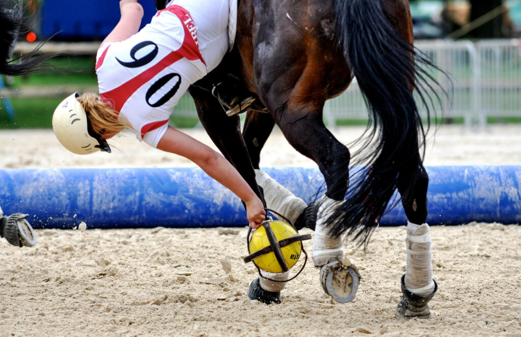 Equestrian Fall Action: Intense Competitive Match Wallpaper Background