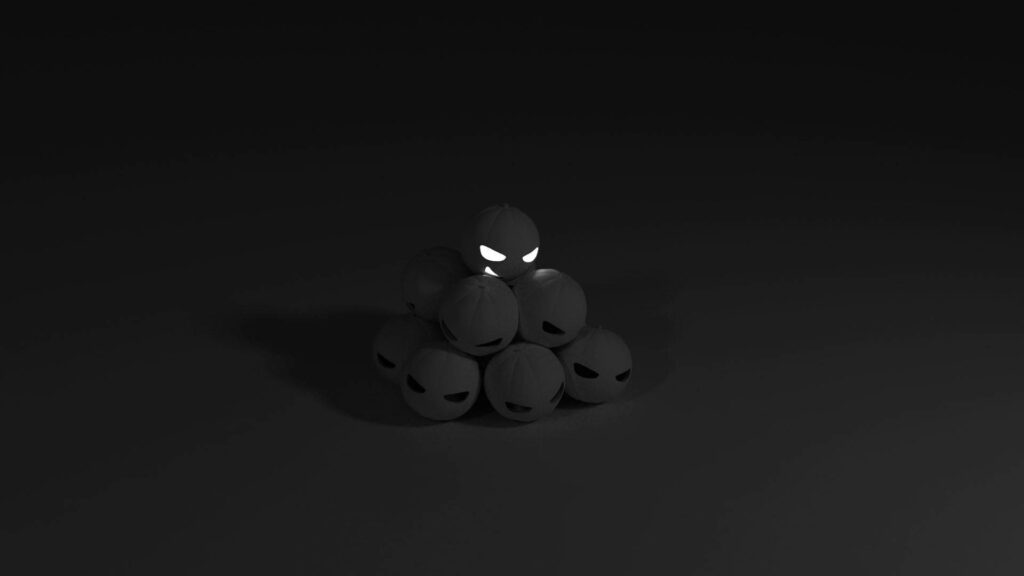 Minimalist 3D dark spheres stack with glowing sinister eyes on charcoal background wallpaper