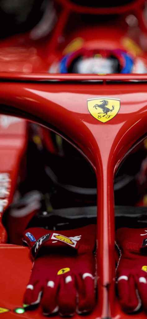 The Majestic Scuderia Ferrari: A Striking Close-Up of F1 Legacy Wallpaper