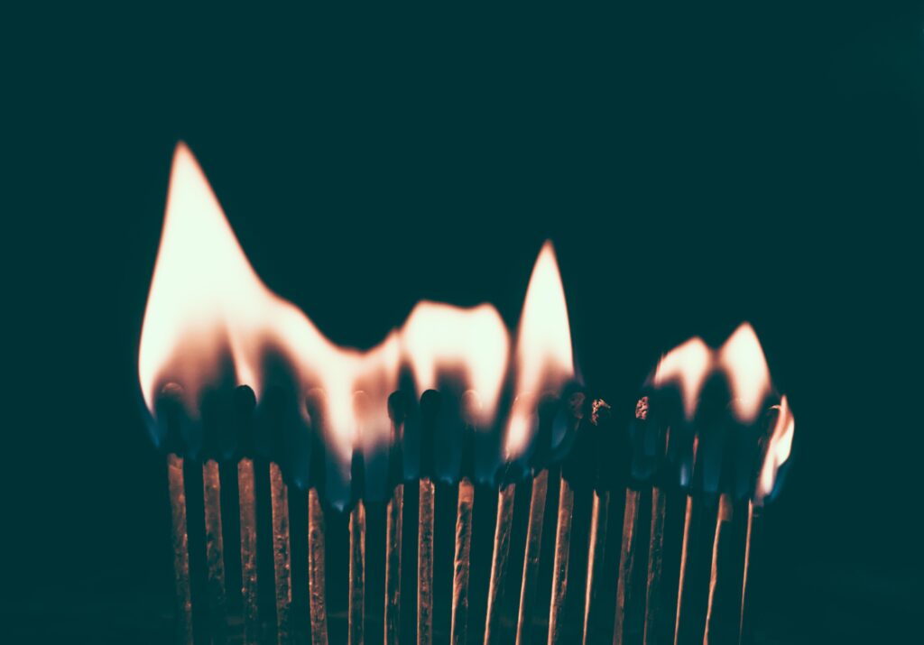 Stunning Macro Shot of Fiery Matches - Dark Background Wallpaper
