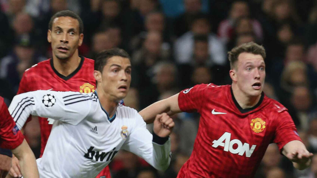  Cristiano Ronaldo & Phil Jones Intense Football Match Wallpaper