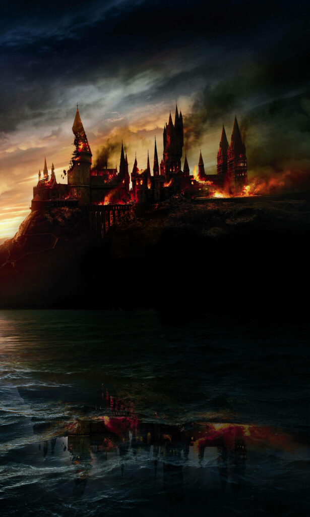 Intense Harry Potter Hogwarts Wallpaper: Flames & Dramatic Sky