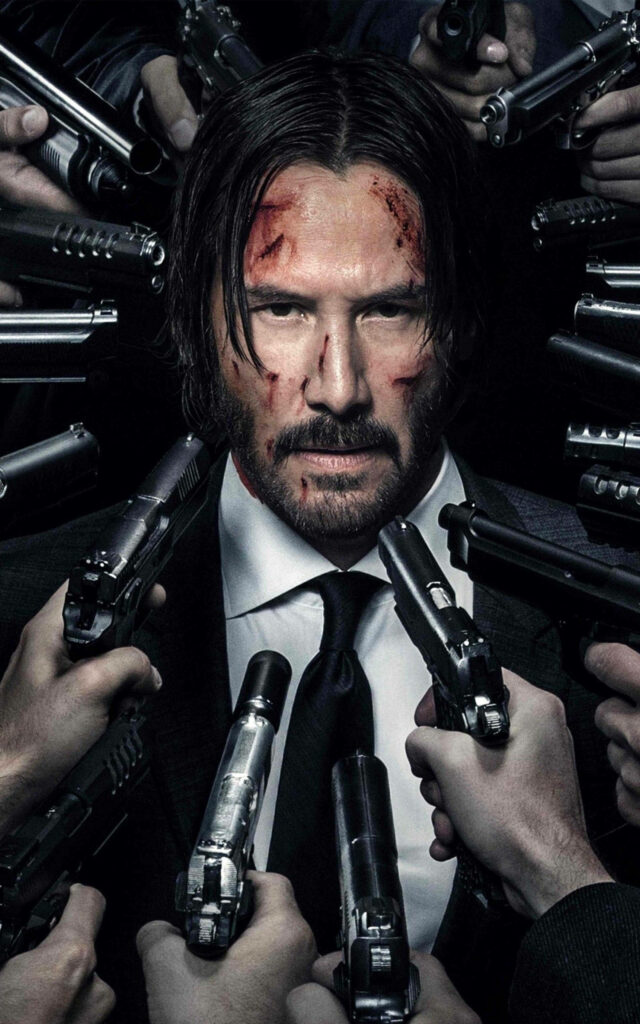 John Wick 2 Wallpaper: Intense Action with Keanu Reeves & Guns