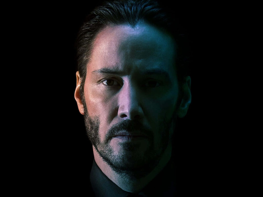 Intense John Wick Wallpaper: Keanu Reeves Dark Background Art