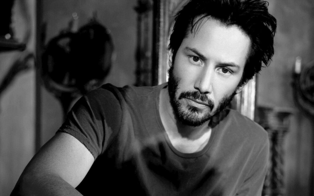 Keanu Reeves Black-and-White Wallpaper: Intense Contemplative Pose