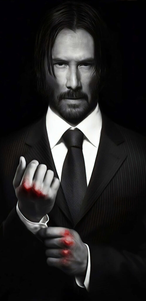 Intense Keanu Reeves Wallpaper: Sharp Suit & Dramatic Detailing