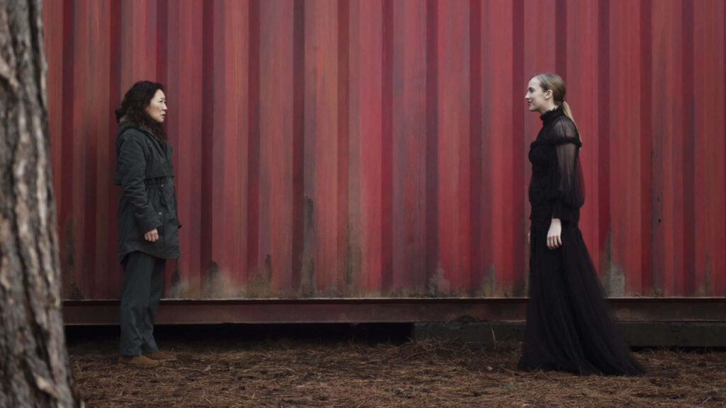 Killing Eve Wallpaper: Intense Confrontation with Bold Red Backdrop