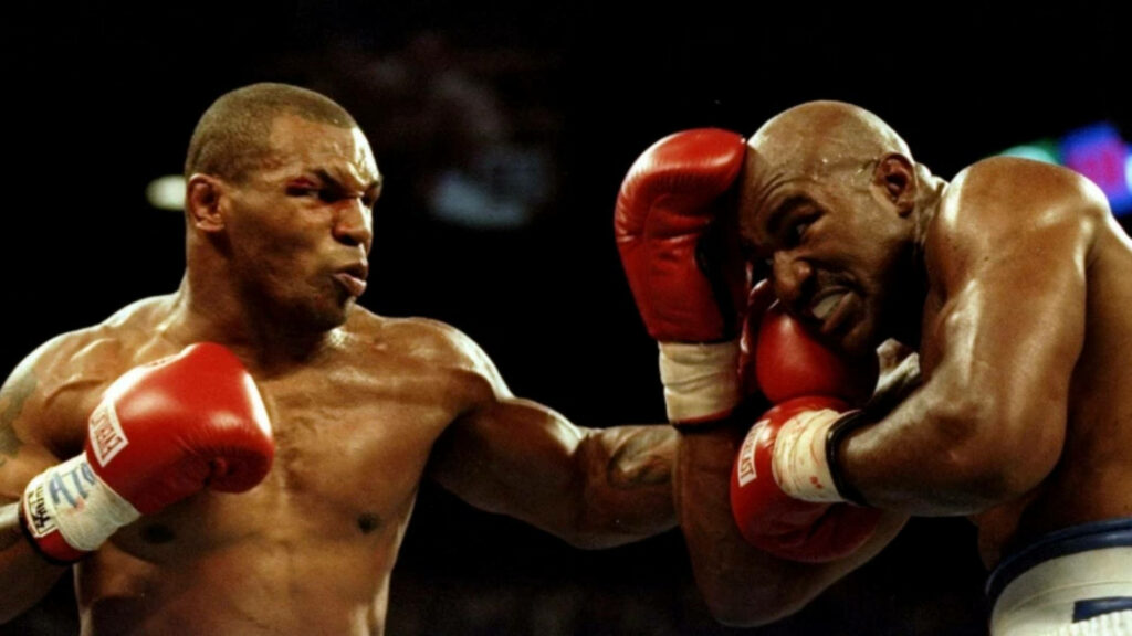 Epic Boxing Wallpaper: Tyson vs Holyfield Intense Match Moment