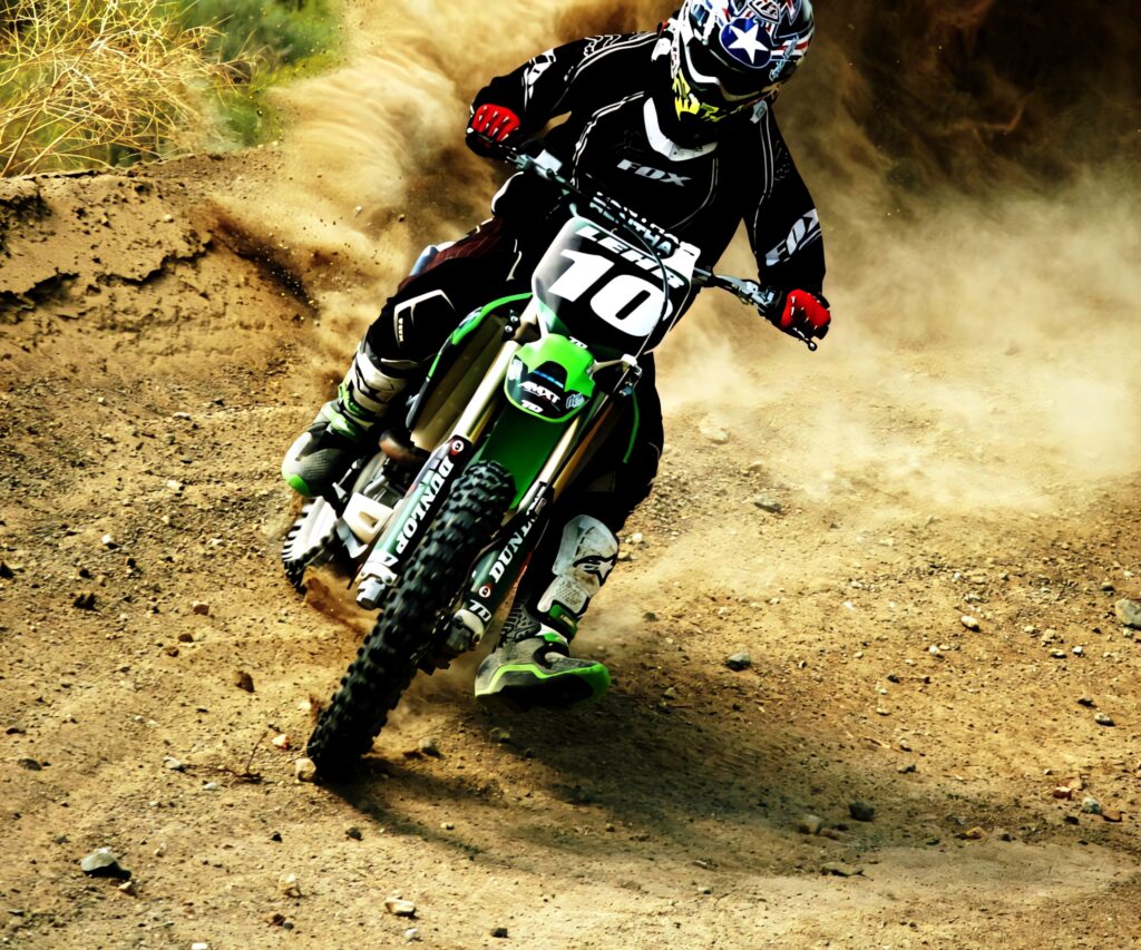 Thrilling Motocross Rider Dynamic Wallpaper - Off-Road Action Background