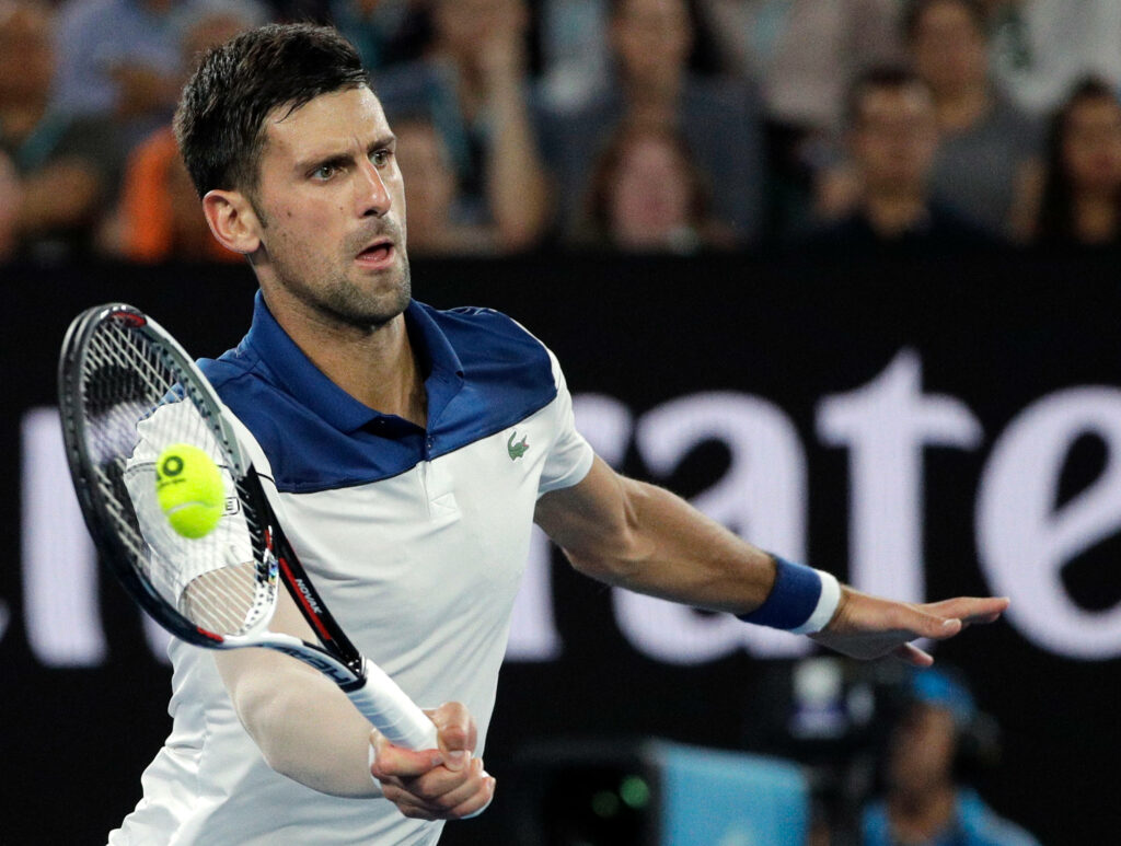 Intense Novak Djokovic Serbian Tennis Wallpaper - Skillful Court Action