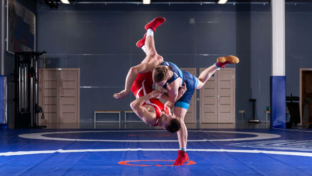 Intense Olympic Wrestling Scene Wallpaper for Sports Enthusiasts