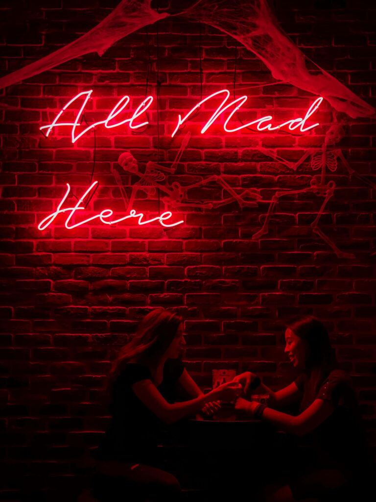 All Mad Here Neon Red and Black Lights Background Wallpaper