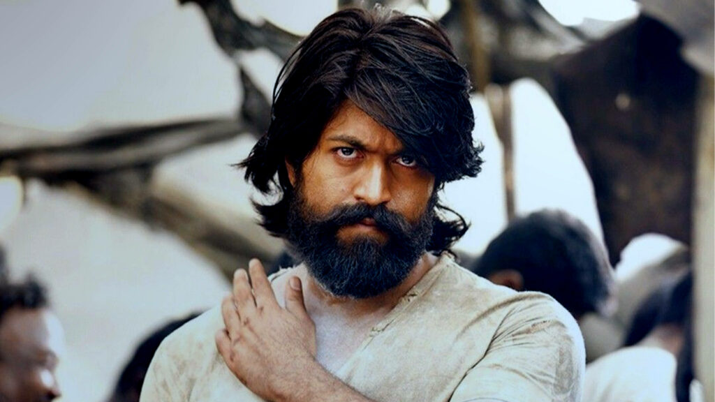 Determined and Intense: Captivating 4k Portrait of Serious Rocky from KGF Films, Against Blurred Background Wallpaper