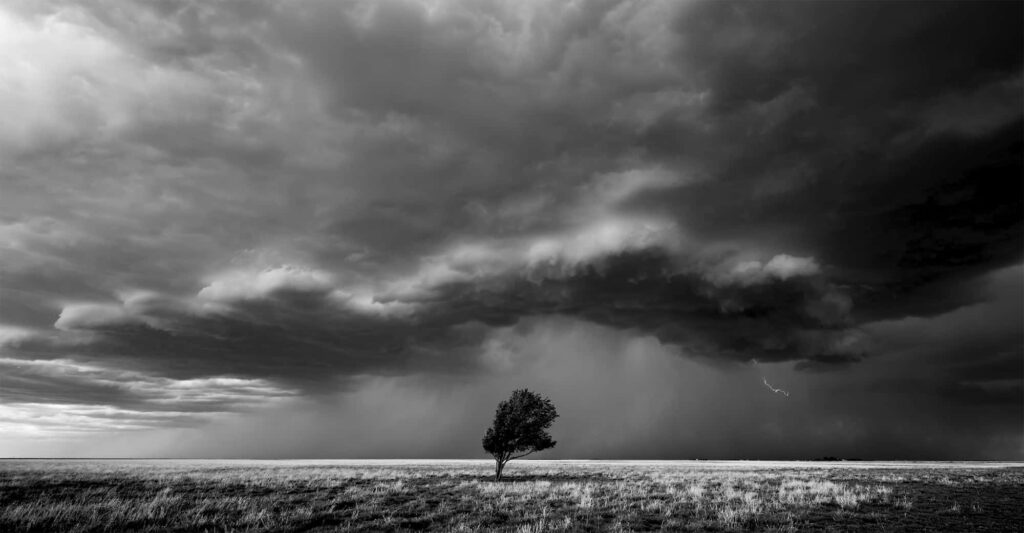 Intense Storm Wallpaper: Dramatic Black and White Landscape Art