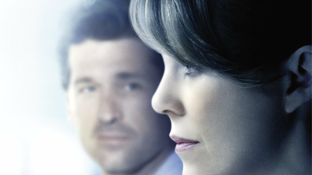 Intense Character Study: Grey's Anatomy Protagonist Captivated in HD Close-up Portrait Wallpaper