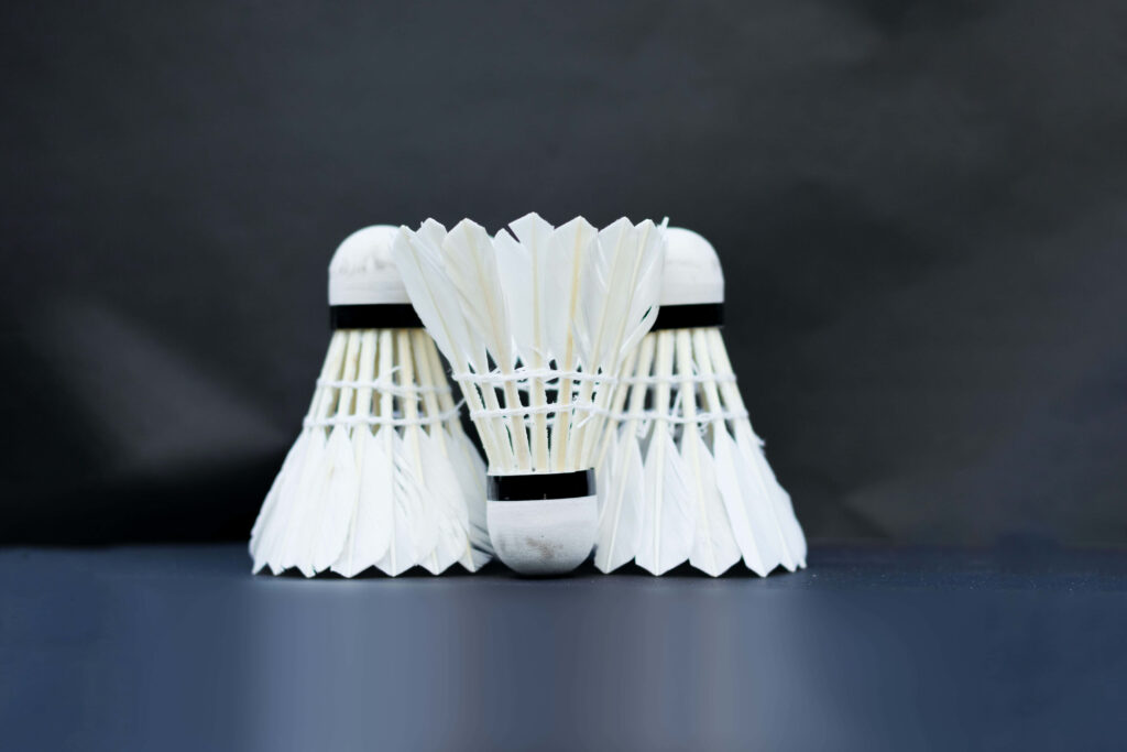3 Badminton Shuttlecock Blur Background Wallpaper
