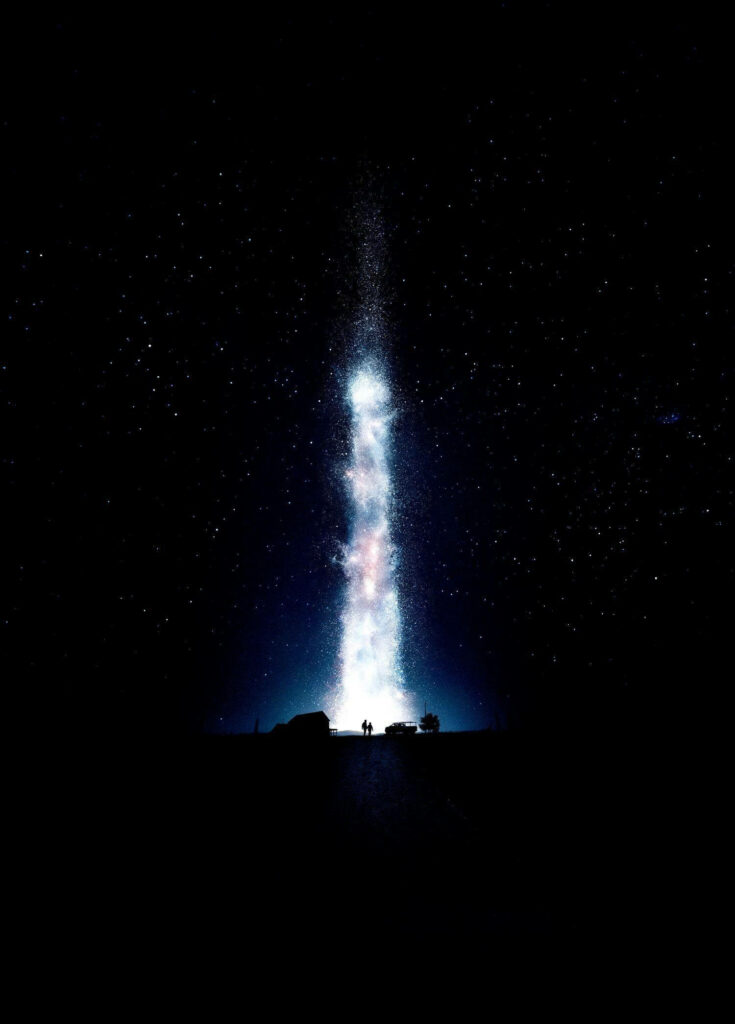 Interstellar inspired OLED iPhone wallpaper with radiant cosmic beam and starry night sky background