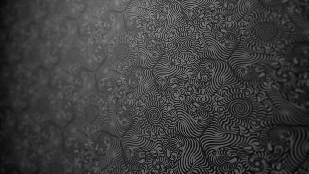 Intricate Hypnotic Black Wallpaper Background with Swirling Patterns