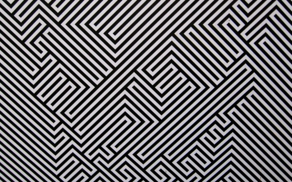 Intricate Black and White Geometric Wallpaper for Modern Interiors