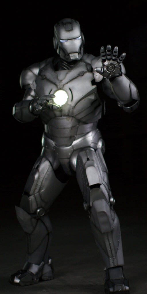 Dynamic Iron Man Action Figure on Striking Black and White Wallpaper