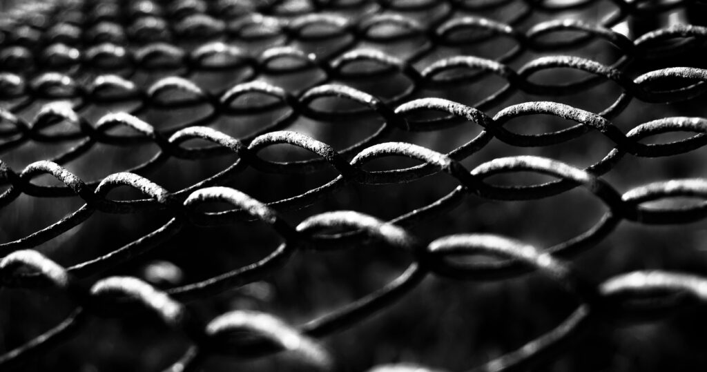 Intricate Black and White Macro Wallpaper: Textured Wire Grid Design