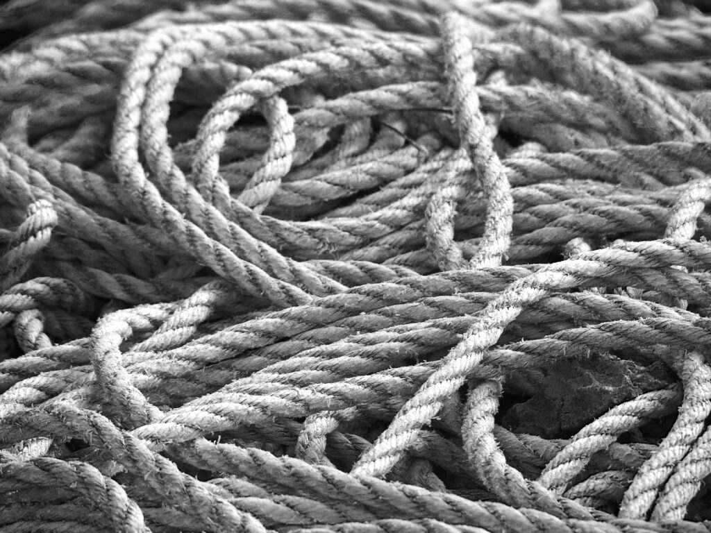 Intricate Black and White Macro Wallpaper of Intertwined Ropes