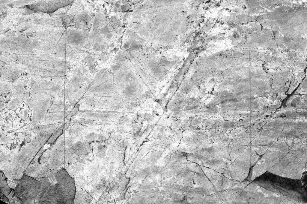 Captivating Black and White Stone Texture Wallpaper Background