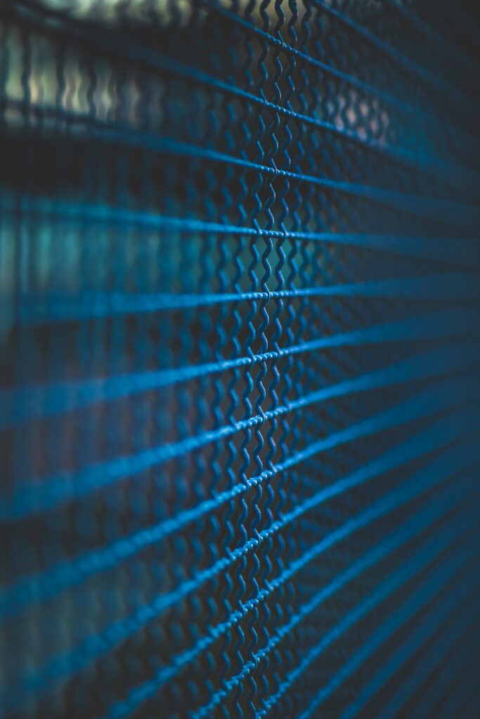 Macro Shot of Intricate Blue Fence Texture - Wallpaper Background