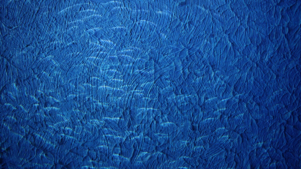 Dynamic Textured Blue Wallpaper for Captivating PC Backgrounds