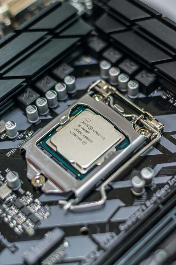 Close-Up of Advanced Computer Motherboard & Processor Wallpaper