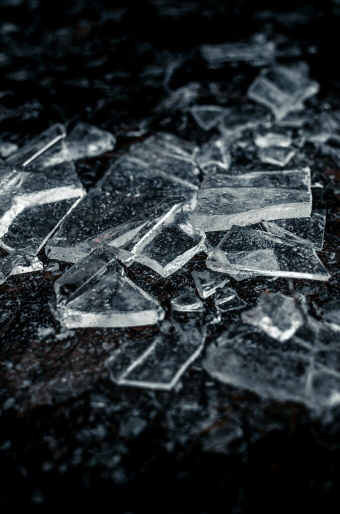 Intricate Ice Shards Macro Wallpaper: Textured Dark Surface Background