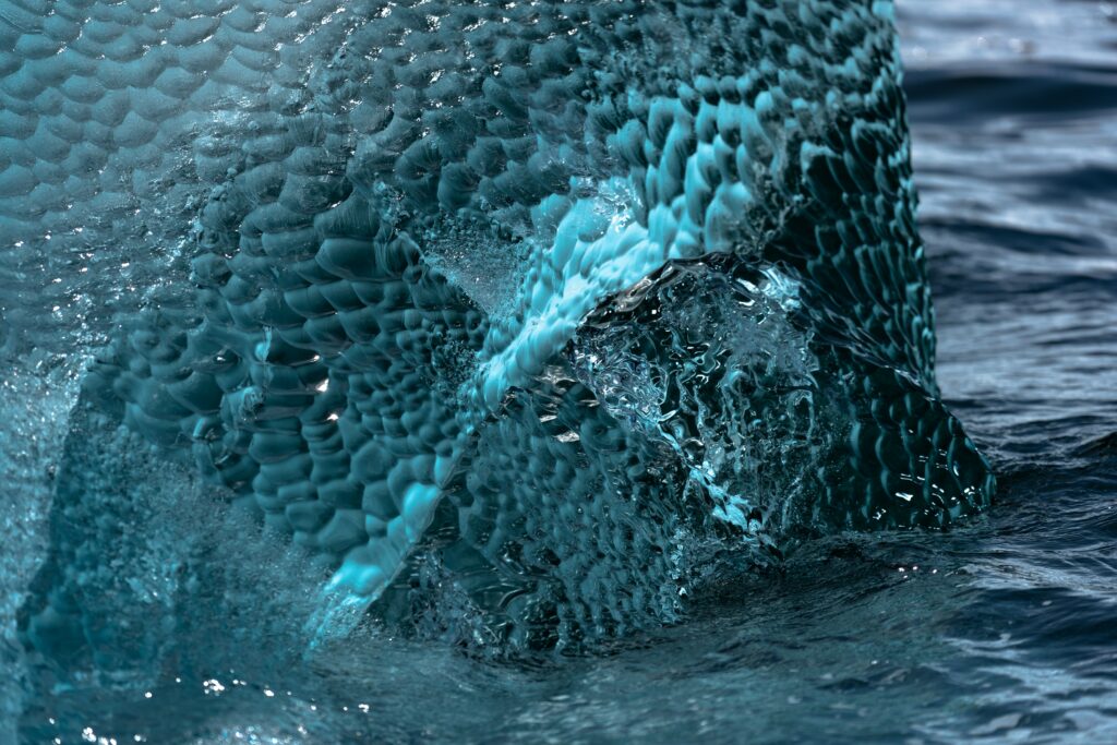 Textured Ice Wallpaper: Blue & Teal Intricate Design Background