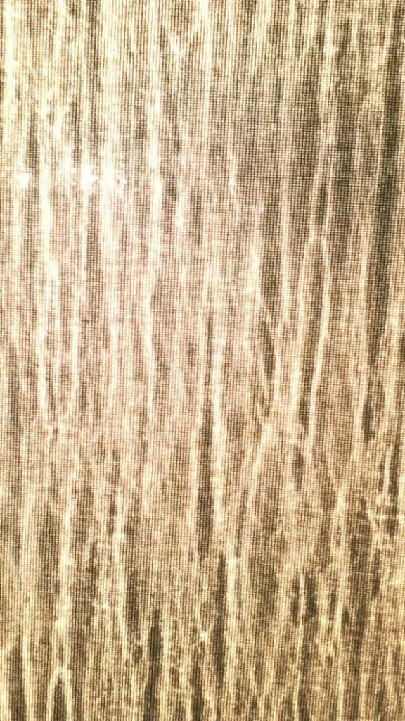 Intricate Leather Texture Wallpaper: Close-Up of Soft, Shiny Patterns