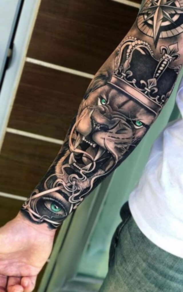Majestic Lion Tattoo with Compass: Leadership & Adventure Design Wallpaper