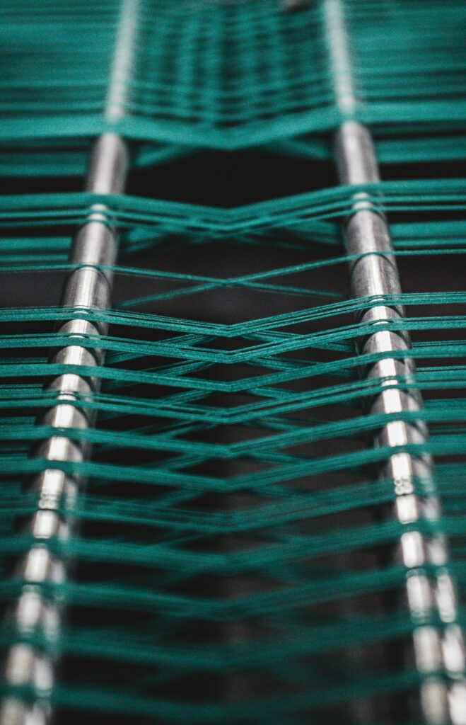 Intricate Green Thread Weaving Wallpaper - Macro Art Background