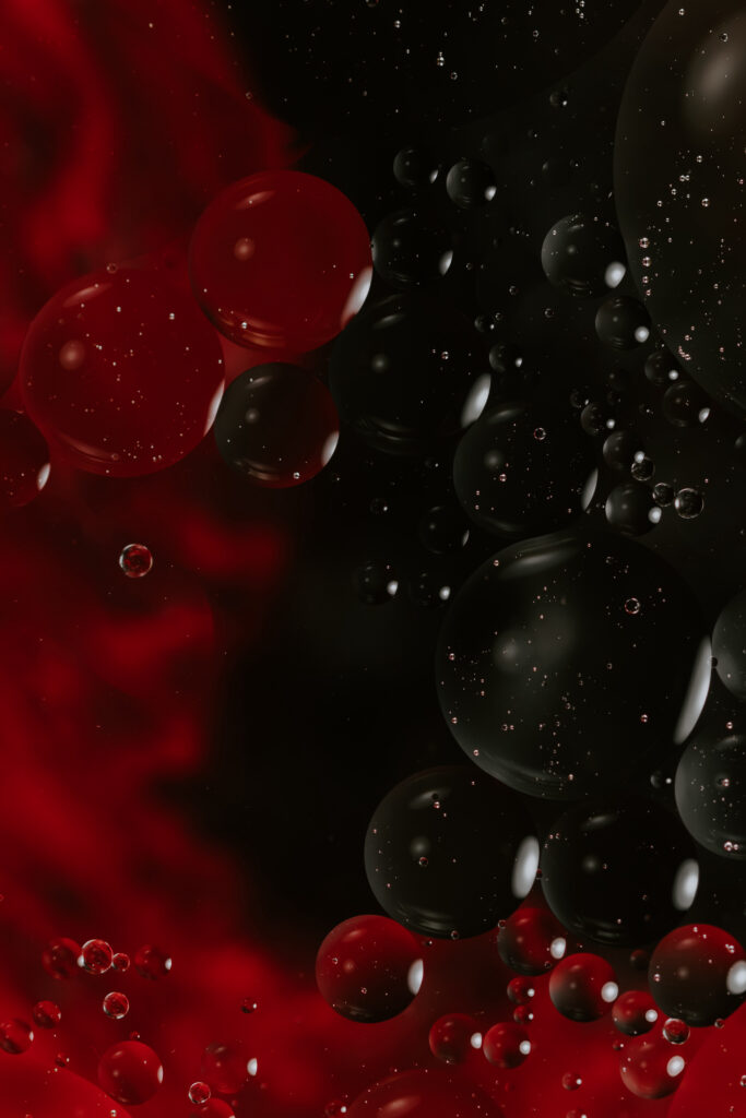 Mesmerizing Macro Bubble Wallpaper in Deep Red and Black Hues