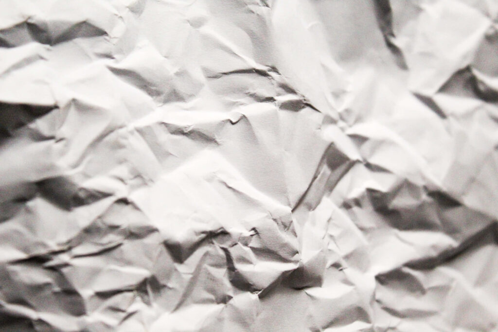 Intricate Creased White Paper Texture for Minimalist Wallpaper Background
