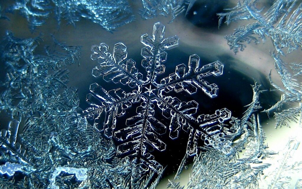Intricate Snowflake Wallpaper: Stunning Winter Geometry Background