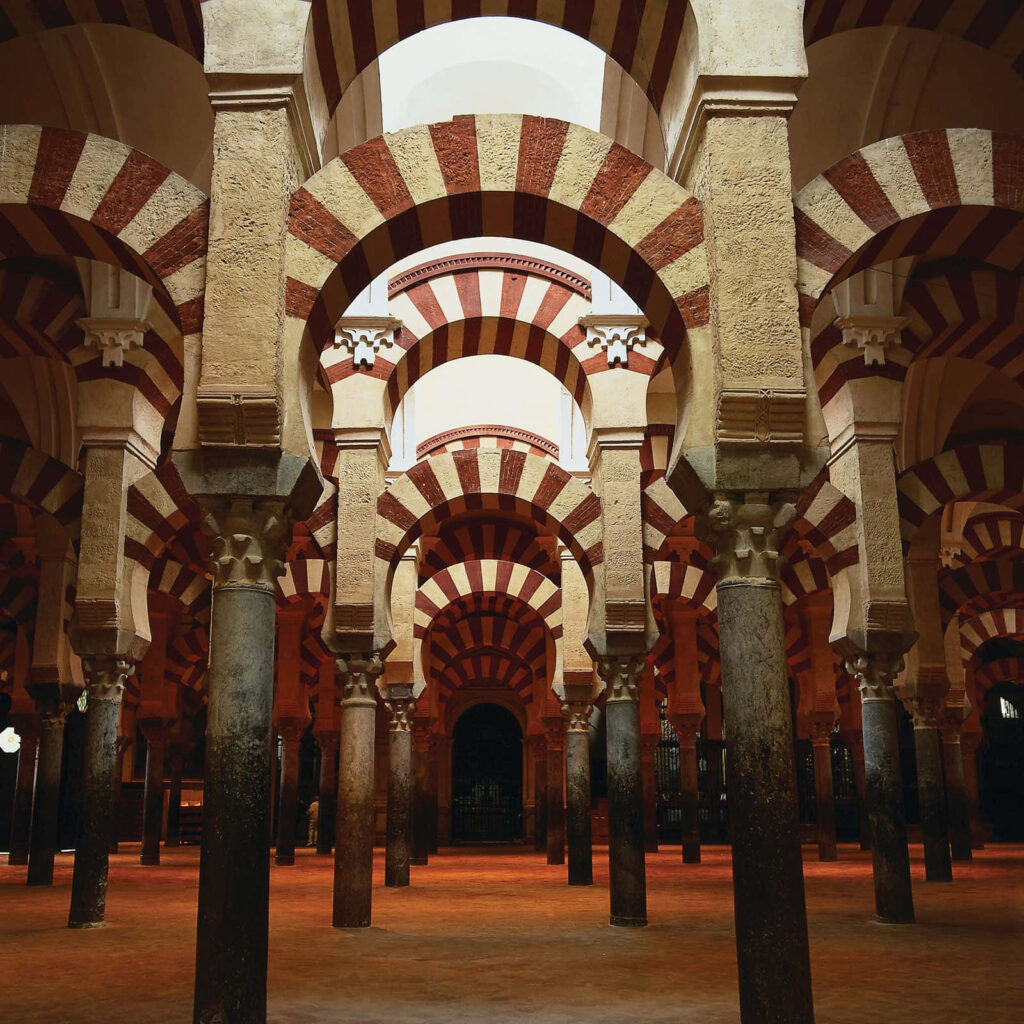 Stunning Spanish Architecture Wallpaper: Red & White Striped Arches